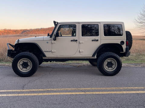 2011 Jeep Wrangler Unlimited for sale at A&P Auto Sales in Van Buren AR