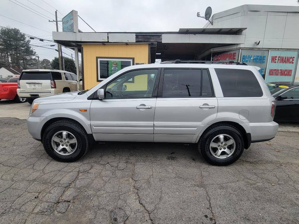 2007 Honda Pilot for sale at DAGO'S AUTO SALES LLC in Dalton, GA