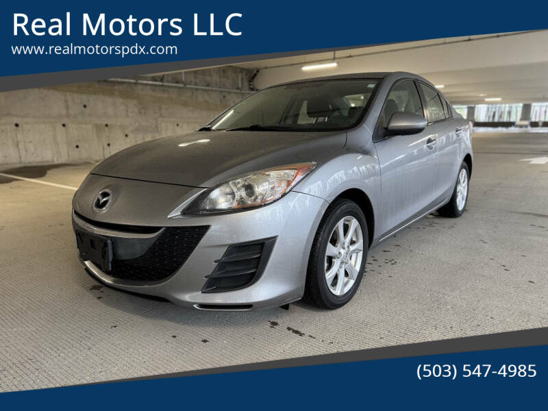 2010 Mazda MAZDA3 i Touring's photo