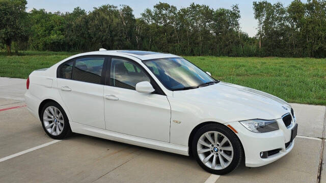 2011 BMW 3 Series for sale at CAR MARKET AUTO GROUP in Sugar Land, TX