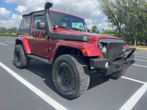 2012 Jeep Wrangler for sale at Nation Autos Miami in Hialeah FL