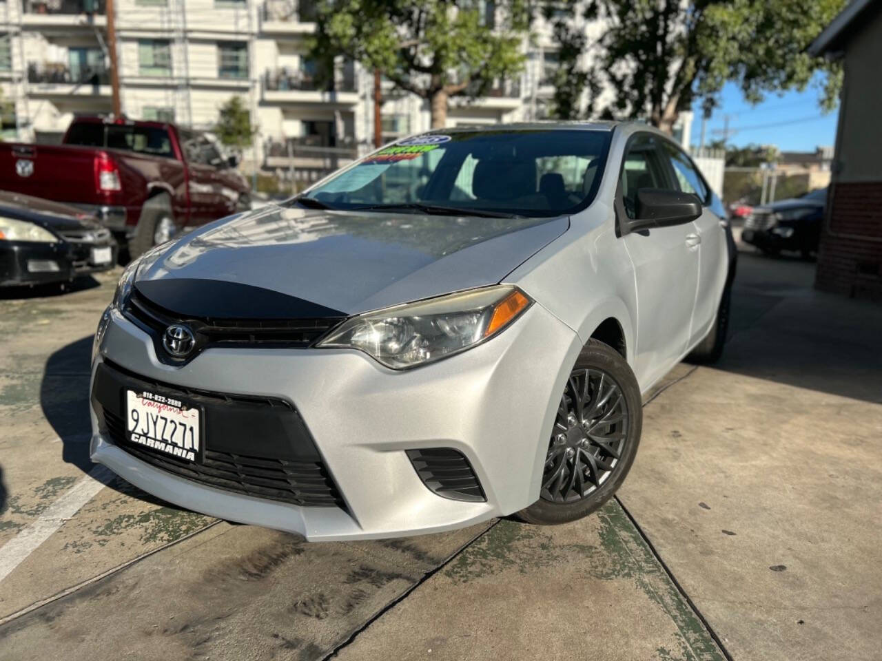 2015 Toyota Corolla for sale at Carmania in Panorama City, CA