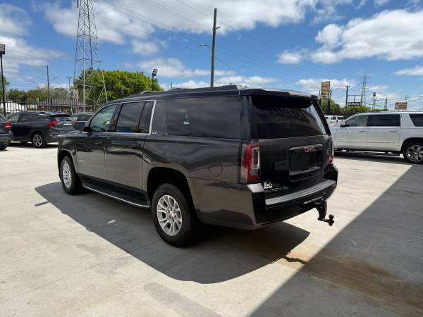 Used 2016 GMC Yukon XL SLE with VIN 1GKS2FKCXGR177369 for sale in Detroit, MI