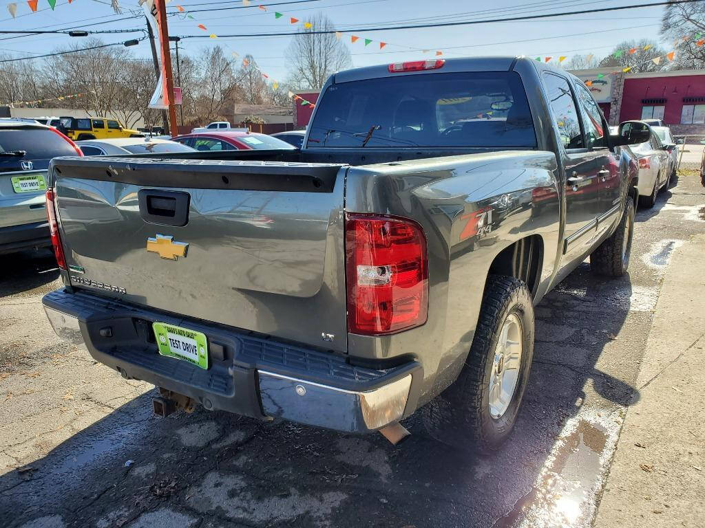 2011 Chevrolet Silverado 1500 for sale at DAGO'S AUTO SALES LLC in Dalton, GA