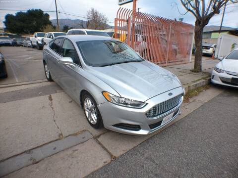 2016 Ford Fusion for sale at ARAX AUTO SALES in Tujunga CA
