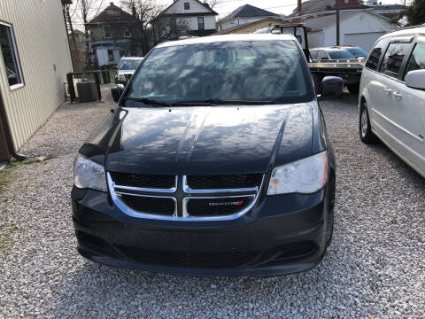 2014 Dodge Grand Caravan for sale at ADKINS PRE OWNED CARS LLC in Kenova WV