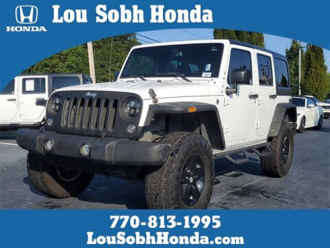2015 Jeep Wrangler Unlimited for sale at Lou Sobh Honda in Cumming GA
