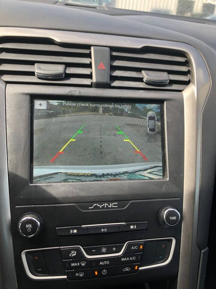 2019 Ford Fusion Hybrid  - $15,500