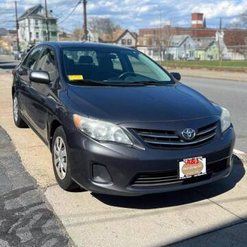 2013 Toyota Corolla for sale at A & J AUTO GROUP in New Bedford MA