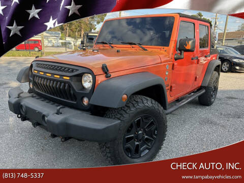 2015 Jeep Wrangler Unlimited for sale at CHECK AUTO, INC. in Tampa FL