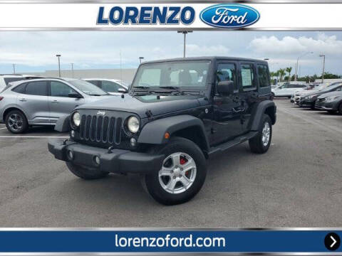 2014 Jeep Wrangler Unlimited for sale at Lorenzo Ford in Homestead FL