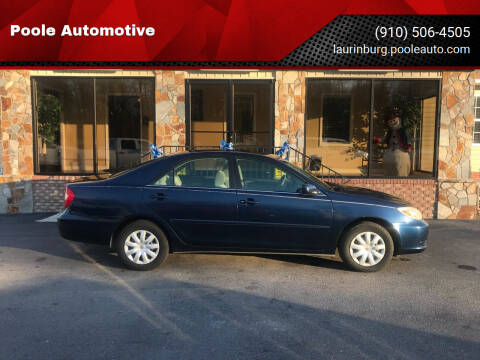 2002 Toyota Camry for sale at Poole Automotive in Laurinburg NC