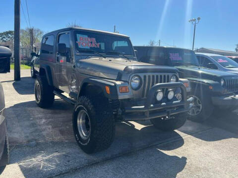 2004 Jeep Wrangler for sale at CE Auto Sales in Baytown TX