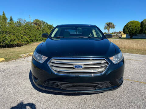 2014 Ford Taurus for sale at LLAPI MOTORS in Hudson FL