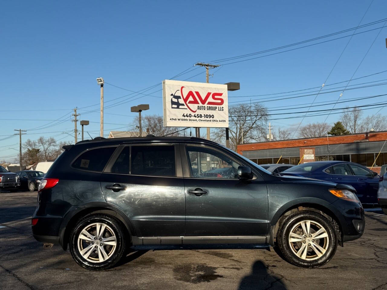 2010 Hyundai SANTA FE for sale at AVS AUTO GROUP LLC in CLEVELAND, OH