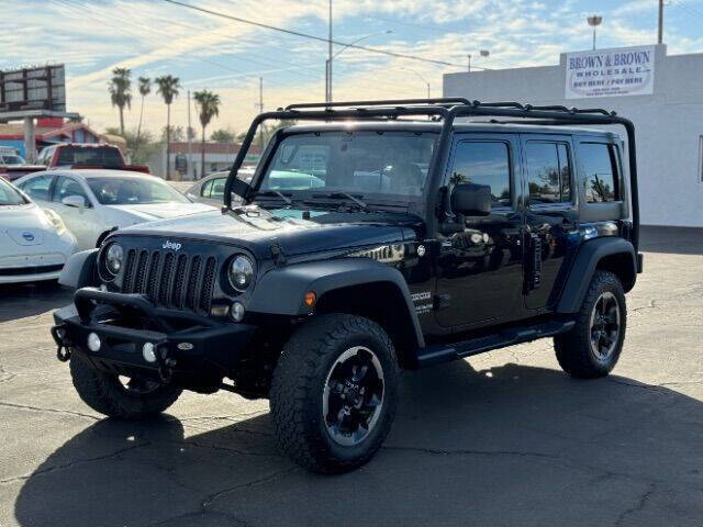 2014 Jeep Wrangler Unlimited for sale at Desert Auto Deals in Tempe AZ