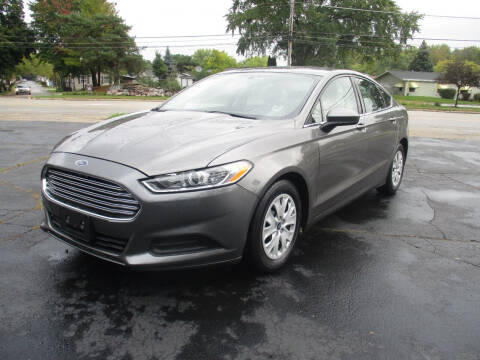 2014 Ford Fusion for sale at Triangle Auto Sales in Elgin IL