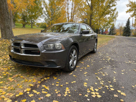 2013 Dodge Charger for sale at BELOW BOOK AUTO SALES in Idaho Falls ID