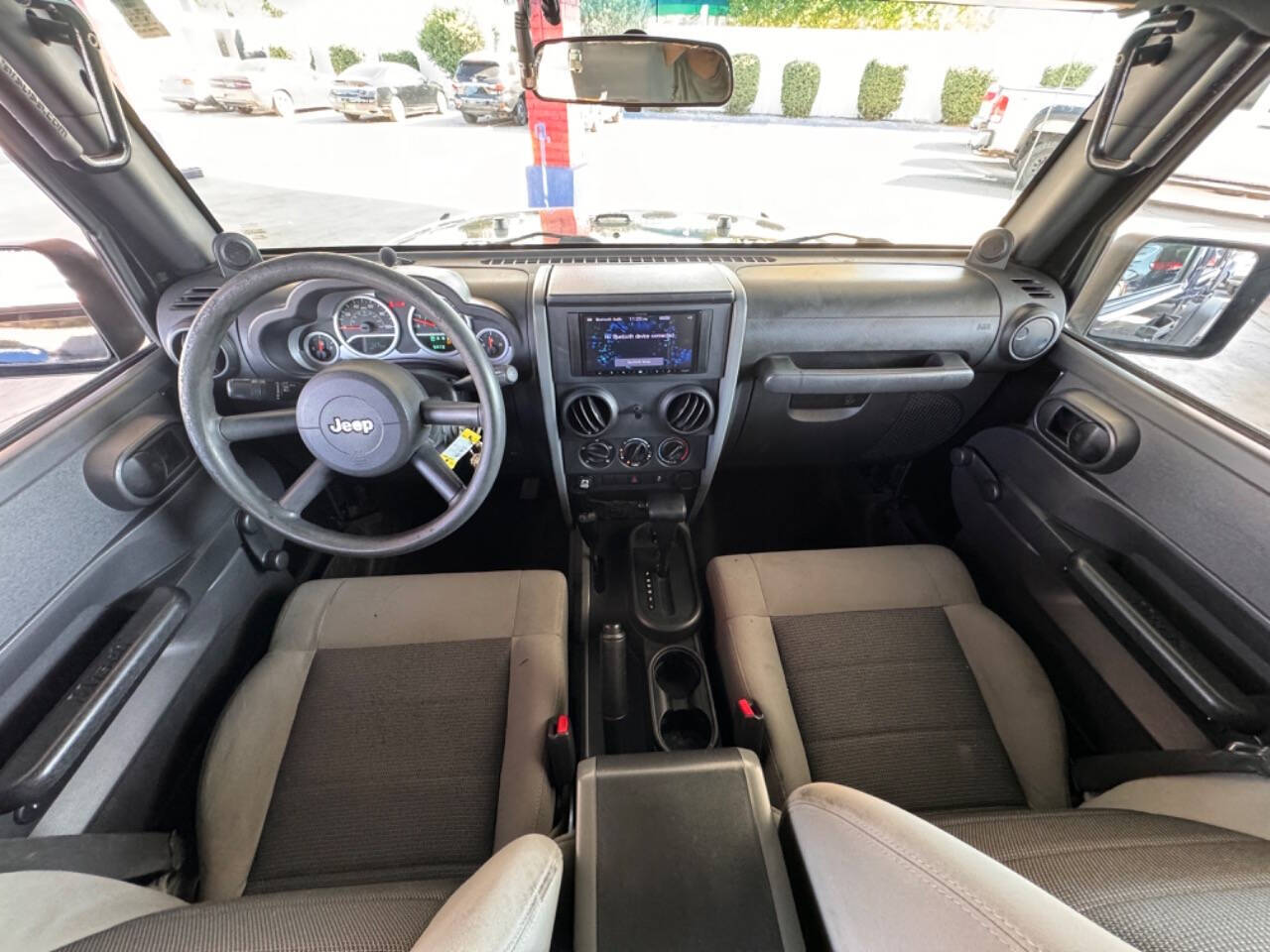 2010 Jeep Wrangler Unlimited for sale at IBAX AUTOMOTIVE LLC in Albuquerque, NM