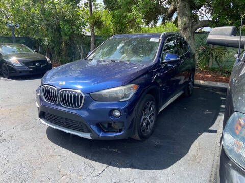 2018 BMW X1 for sale at AUTOSHOW SALES & SERVICE in Plantation FL