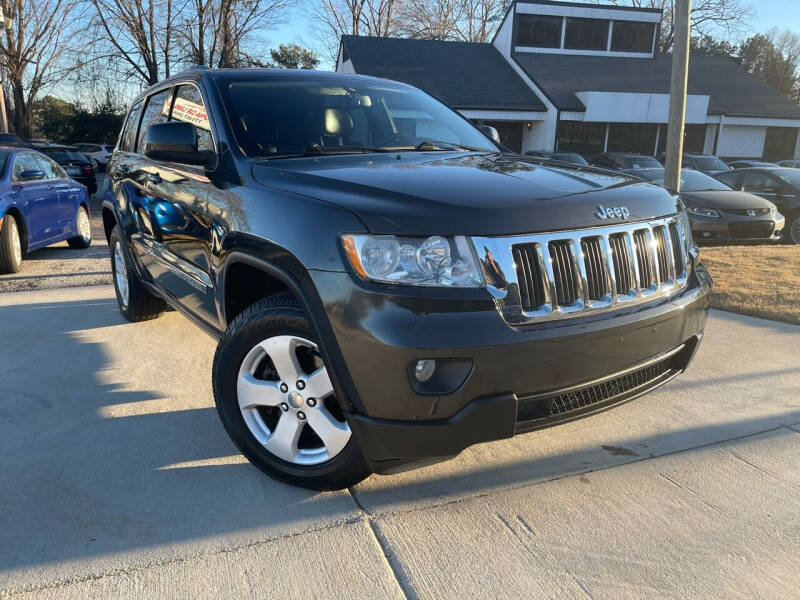 2011 Jeep Grand Cherokee for sale at Alpha Car Land LLC in Snellville GA