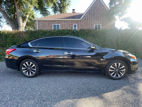 2016 Nissan Altima for sale at Friends Auto Sales in Denver CO