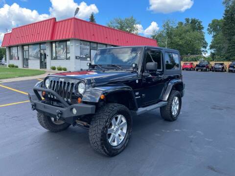 2011 Jeep Wrangler for sale at Select Auto Group in Wyoming MI