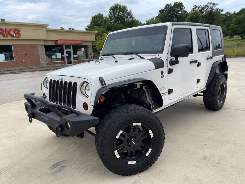 2010 Jeep Wrangler Unlimited for sale at Gwinnett Luxury Motors in Buford GA