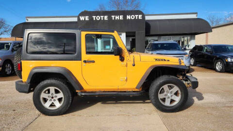 2012 Jeep Wrangler for sale at First Choice Auto Sales in Moline IL