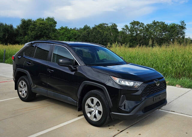 2021 Toyota RAV4 for sale at CAR MARKET AUTO GROUP in Sugar Land, TX