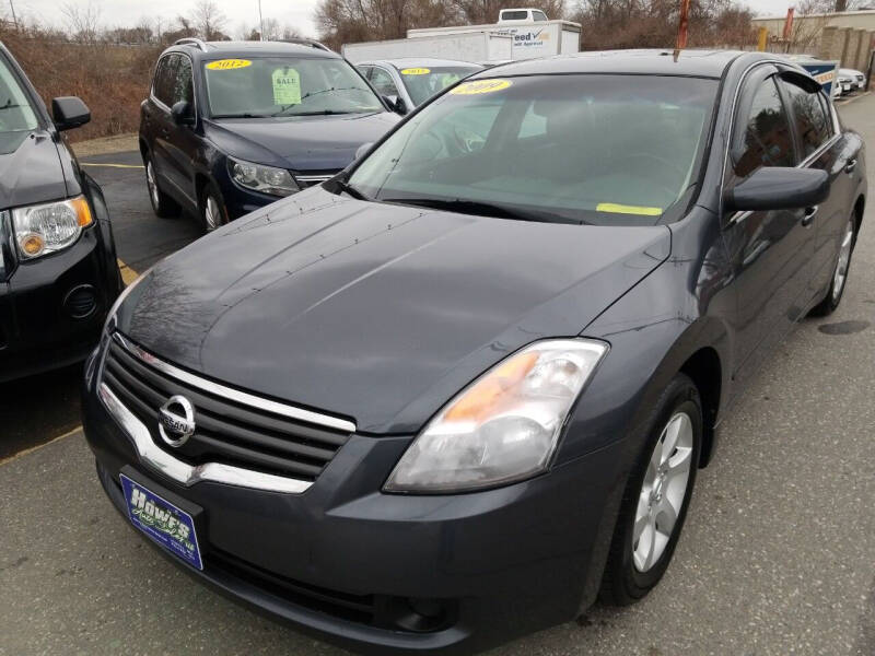 2009 Nissan Altima for sale at Howe's Auto Sales in Lowell MA