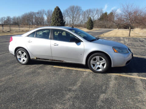 2009 Pontiac G6 for sale at Crossroads Used Cars Inc. in Tremont IL