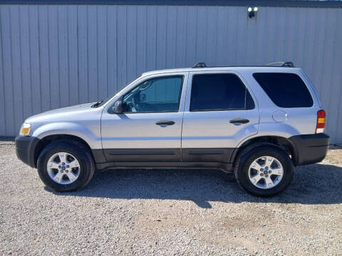 2006 Ford Escape for sale at PURKEYS USED CARS in Coffeyville KS