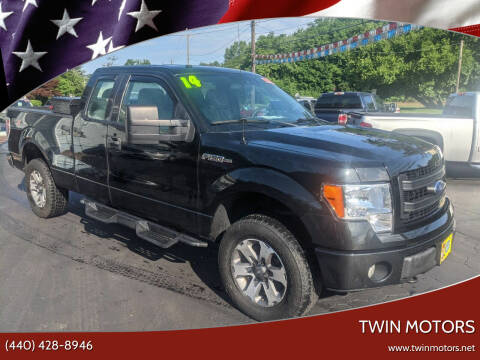 2014 Ford F-150 for sale at TWIN MOTORS in Madison OH