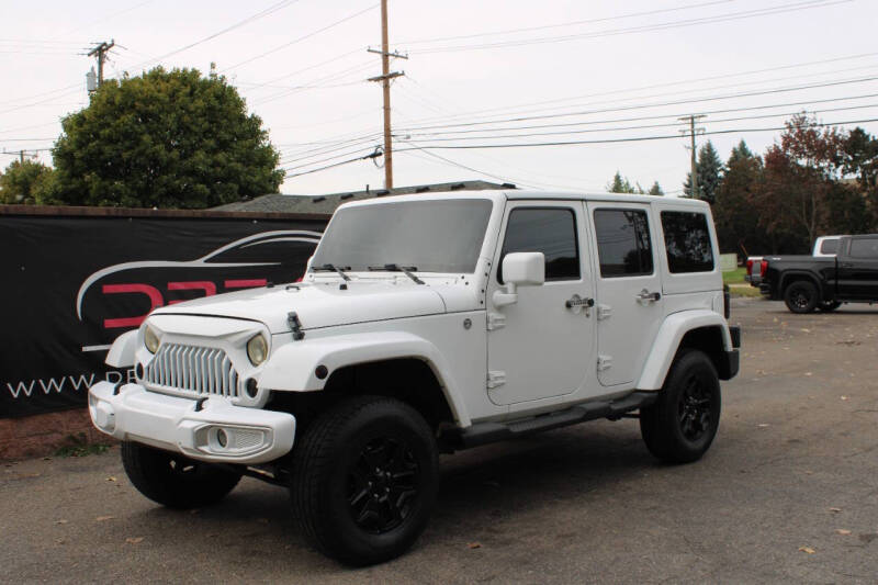 2011 Jeep Wrangler Unlimited for sale at Dream Auto Group in Shelby Township MI