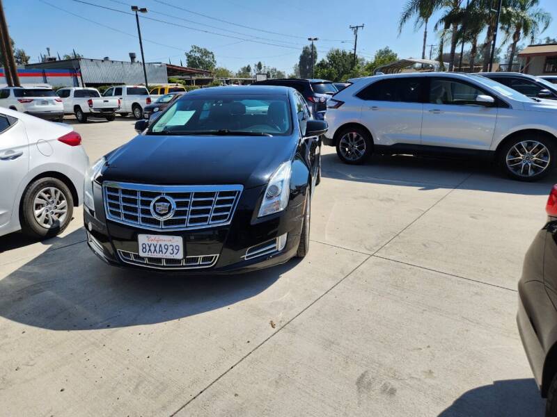 2013 Cadillac XTS for sale at E and M Auto Sales in Bloomington CA