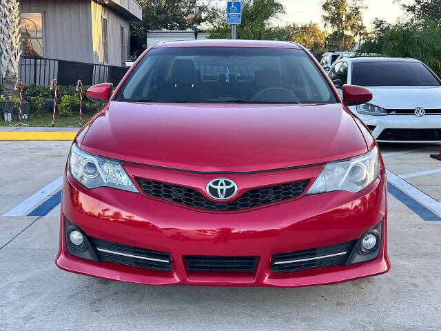 2014 Toyota Camry for sale at DJA Autos Center in Orlando, FL