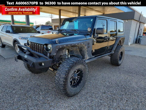 2015 Jeep Wrangler Unlimited for sale at POLLARD PRE-OWNED in Lubbock TX
