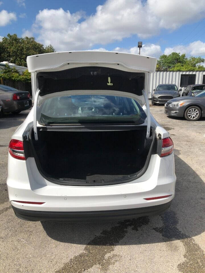 2019 Ford Fusion Hybrid  - $15,500