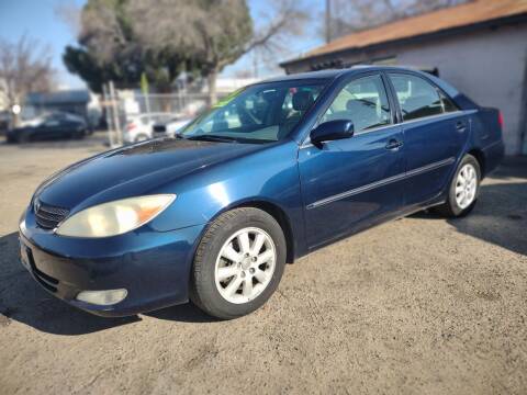 2004 Toyota Camry for sale at Larry's Auto Sales Inc. in Fresno CA