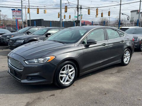 2015 Ford Fusion for sale at SKYLINE AUTO in Detroit MI