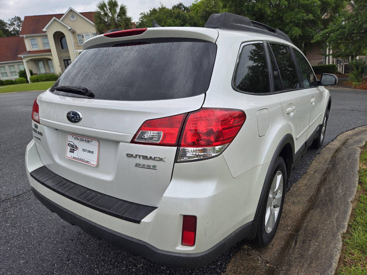 2011 Subaru Outback for sale at Connected Auto Group in Macon, GA