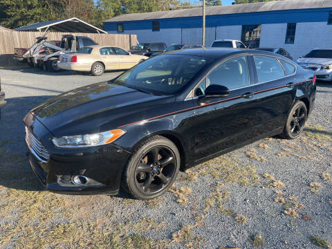 2016 Ford Fusion for sale at LAURINBURG AUTO SALES in Laurinburg NC