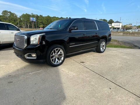 2015 GMC Yukon XL for sale at WHOLESALE AUTO GROUP in Mobile AL