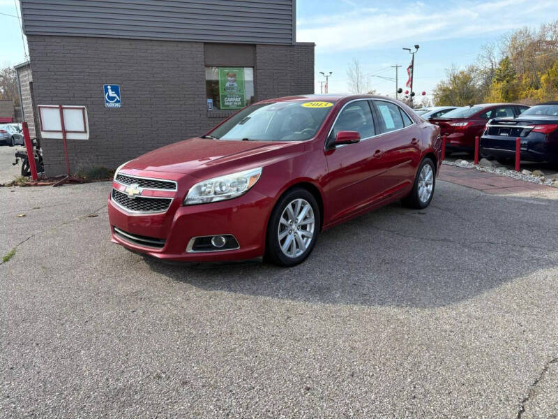 2013 Chevrolet Malibu for sale at George's Used Cars in Brownstown MI