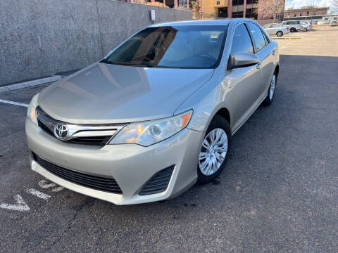 2014 Toyota Camry for sale at AROUND THE WORLD AUTO SALES in Denver CO