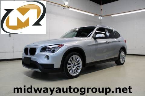 2014 BMW X1 for sale at Midway Auto Group in Addison TX