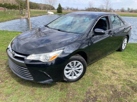2016 Toyota Camry for sale at K2 Autos in Holland MI