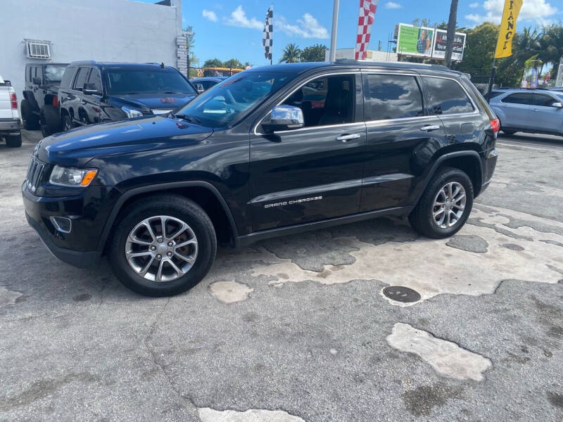 2014 Jeep Grand Cherokee for sale at America Auto Wholesale Inc in Miami FL