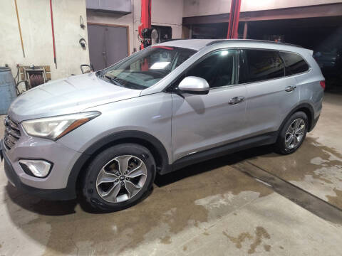 2014 Hyundai Santa Fe for sale at SWENSON MOTORS in Gaylord MN